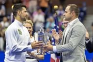 Novak Djokovic and Andy Roddick at the US Open 2023 - Source: Getty